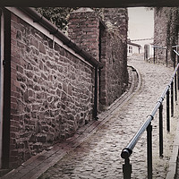 Buy canvas prints of Welsh cobbled street by Susan Tinsley