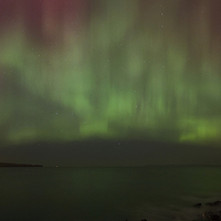 Buy canvas prints of  Aurora over Thurso Bay by Chris Griffin