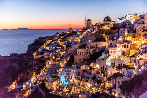 Sunset in Oia Santorini Picture Board by Alan Sinclair