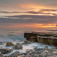 Buy canvas prints of South Shields rocks at sunrise by Marcia Reay