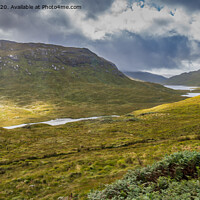 Buy canvas prints of A lush green hillside with three lochs in the back by Marcia Reay