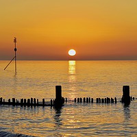 Buy canvas prints of Hunstanton at Sunset by Ros Ambrose
