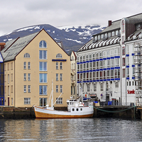 Buy canvas prints of  Alesund harbour, Norway. by Tom Pipe