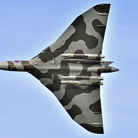 Buy canvas prints of  Mighty Vulcan Bomber XH558 Flying side on. by Tom Pipe