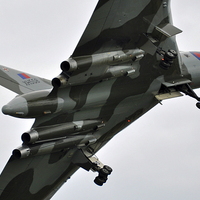 Buy canvas prints of  Vulcan XH558 swooping descent for the missed appr by Tom Pipe