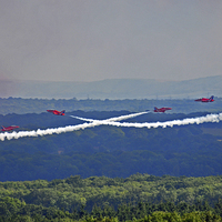 Buy canvas prints of  Red arrows crossing over nice landscape. by Tom Pipe