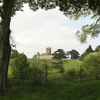 Buy canvas prints of The famous Downton Abbey on top of the hill by James Tully