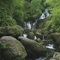 Buy canvas prints of  The many falls at Torc waterfall in Ireland by James Tully