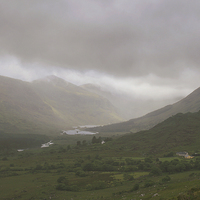 Buy canvas prints of  Heavy clouds sit within an Irish valley by James Tully