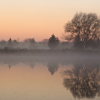 Buy canvas prints of   Foggy  Sunrise Reflection  by shawn mcphee I