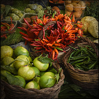 Buy canvas prints of Red, Orange and Green Peppers at the Market by Mary Machare