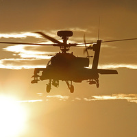 Buy canvas prints of  Sunset Apache AH64 attack Helicopter by Martyn Wraight