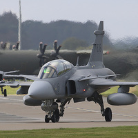 Buy canvas prints of Saab JAS 39 Gripen at RAF Lossiemouth in Scotland by Martyn Wraight