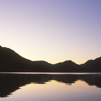 Buy canvas prints of  Winter Dawn at Crummock Water by Peter Yardley