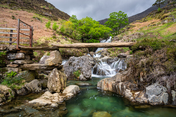 Watkin Path footbridge and waterfalls, Snowdonia national park Picture Board by Andrew Kearton