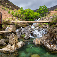 Buy canvas prints of Watkin Path footbridge and waterfalls, Snowdonia national park by Andrew Kearton