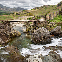 Buy canvas prints of Stone footbridge in Cwm Llan, Snowdonia, Wales by Andrew Kearton