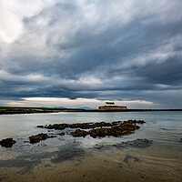 Buy canvas prints of St Cwyfan's Church, Aberffraw, Anglesey by Andrew Kearton