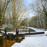 Buy canvas prints of Marple Locks in the snow by Andrew Kearton