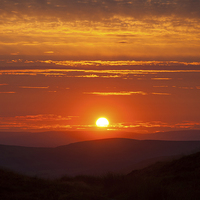 Buy canvas prints of  Deep orange sunset in the High Peak by Andrew Kearton