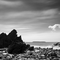 Buy canvas prints of Floaty cloud above Marloes sands in Pembrokeshire by Andrew Kearton