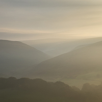 Buy canvas prints of  A gentle mist over Peak District hills by Andrew Kearton
