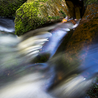 Buy canvas prints of  Smooth flow in a moorland stream by Andrew Kearton