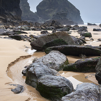 Buy canvas prints of Dramatic rocky shore at Bedruthan steps, Cornwall by Andrew Kearton
