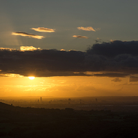 Buy canvas prints of  Golden sunset over Manchester by Andrew Kearton