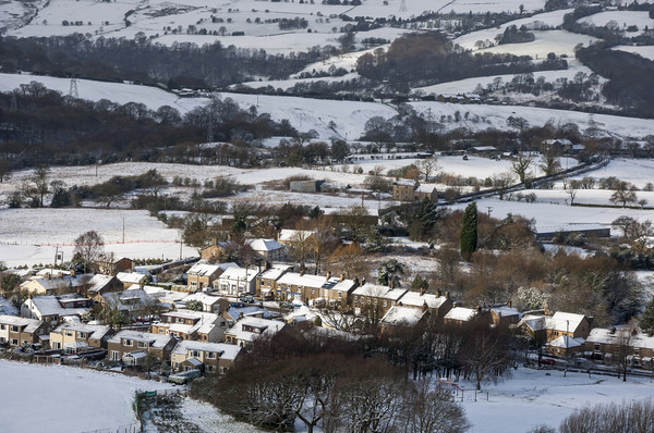 Village in the snow Picture Board by Andrew Kearton