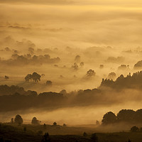 Buy canvas prints of Golden mist over Castleton by Andrew Kearton