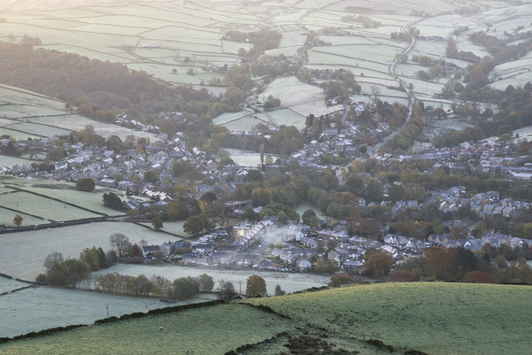 The village of Hayfield on a frosty morning Picture Board by Andrew Kearton
