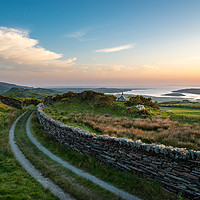 Buy canvas prints of Farm track in a beautiful Welsh landscape by Andrew Kearton
