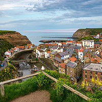 Buy canvas prints of Staithes at dusk by Andrew Kearton