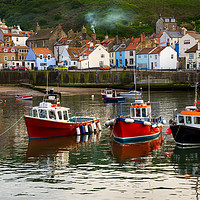 Buy canvas prints of Boats in the harbour, Staithes, North Yorkshire by Andrew Kearton