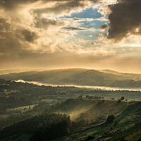 Buy canvas prints of Mist and sunbeams over Charlesworth, Derbyshire by Andrew Kearton