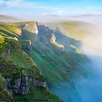 Buy canvas prints of Winnats Pass with morning mist by Andrew Kearton