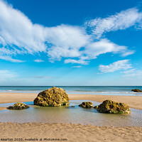 Buy canvas prints of Rock pool at Filey Bay, North Yorkshire by Andrew Kearton