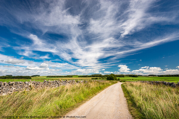 Wispy summer clouds in the White Peak, Derbyshire Picture Board by Andrew Kearton