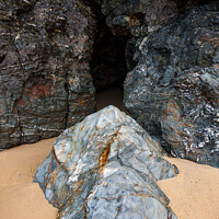 Buy canvas prints of Cave in the cliffs at Perranporth, Cornwall by Andrew Kearton