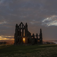 Buy canvas prints of Sun setting over Whitby Abbey by David Oxtaby  ARPS