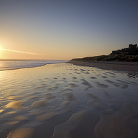 Buy canvas prints of  Bamburgh Sunrise by Alexander Perry