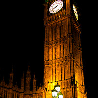 Buy canvas prints of A clock tower lit up at night by henry harrison