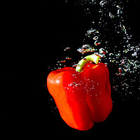 Buy canvas prints of high speed photography peppers  by kevin long