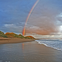 Buy canvas prints of  Rainbow On Beach by Eric Watson