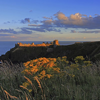 Buy canvas prints of  Dunnottar Castle at Sunset by Eric Watson