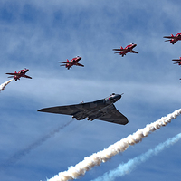 Buy canvas prints of  Vulcan XH558 and Red Arrows farewell Flight by Neil Vary