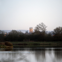 Buy canvas prints of St Sampson's Church, Cricklade across the meadows by Graham Light