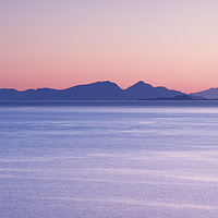Buy canvas prints of Sunrise over the Islands of Rhum & Sky by Richard Burdon