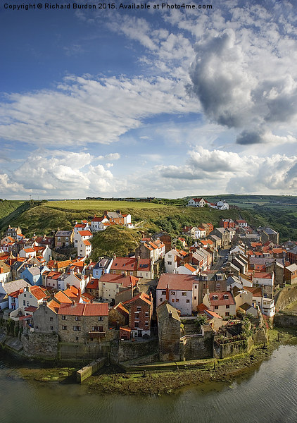 Late afternoon light on the village of Staithes Picture Board by Richard Burdon